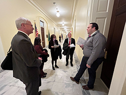 Talking in hall with staffer