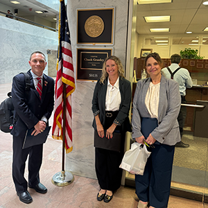 Group photo outside Iowa rep's office